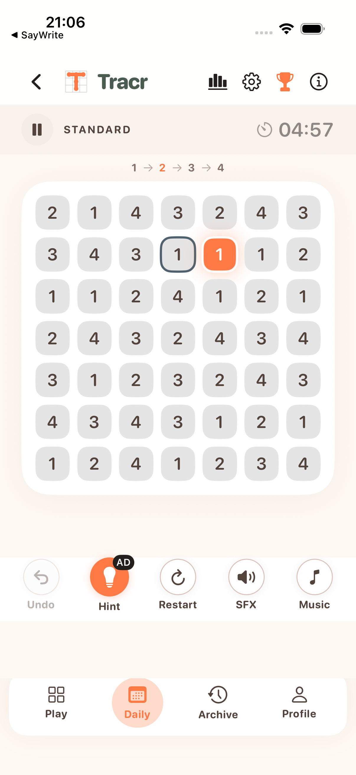 Tracr gameplay screen showing a numbered grid, next target, timer, undo, hint, and restart controls.